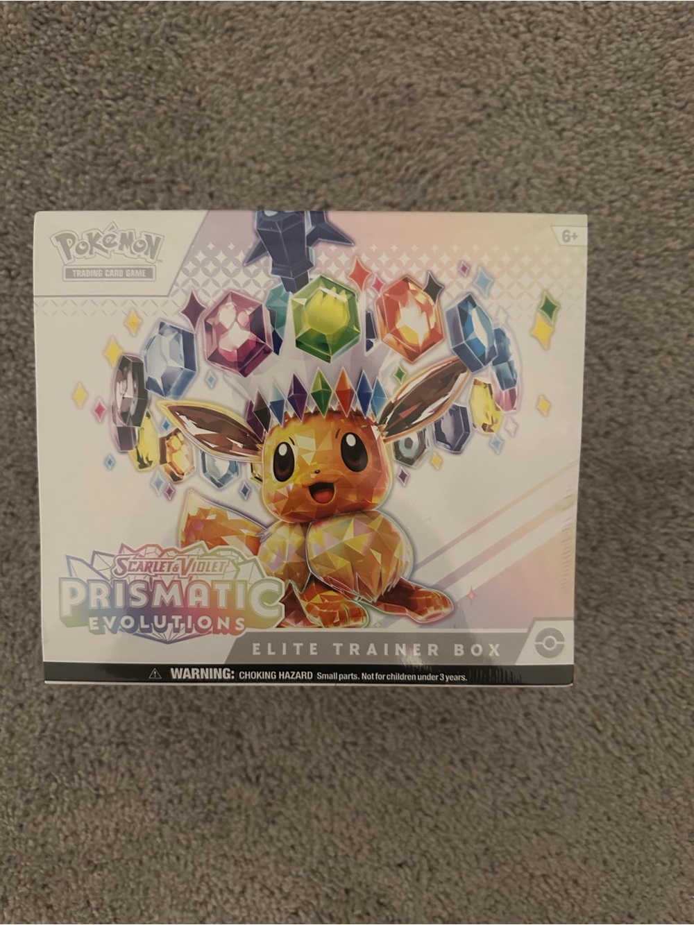 Pokémon TCG: Scarlet & Violet—Prismatic Evolutions Elite Trainer Box *SMALLTEAR*